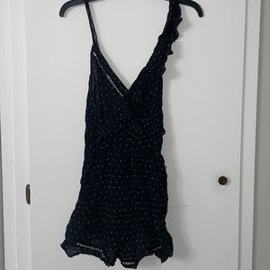 Free people black romper size medium NWT